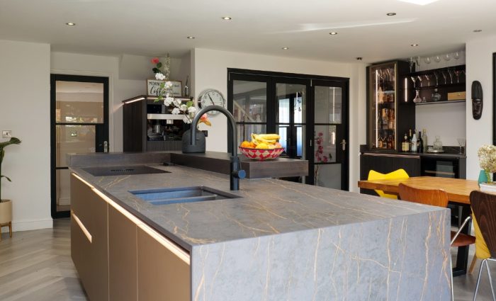 neoLodge Blackened Oak kitchen and bar extension with waterfall island, Nolte Kitchens Nottingham showroom design in Derby