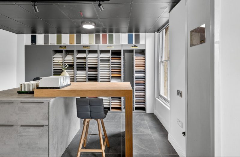 Nolte Stone desk display at Nolte Kitchens Bath showroom with Nolte laminate worktop samples, kitchen finishes and colour samples.