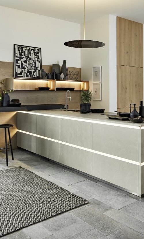 A light, modern nolte kitchen, comprised of popular ranges Portland (grey cement) and Tavola (oak)