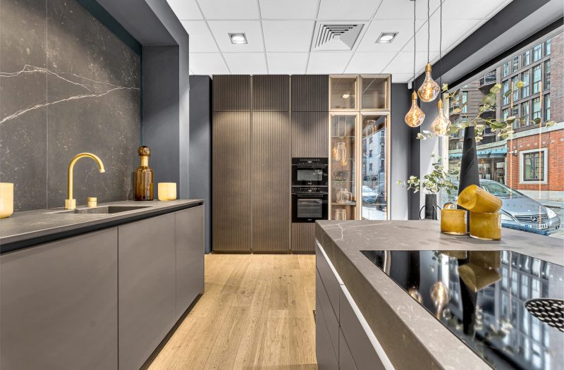 Fluted wood kitchen frontal in Nolte Westminster's kitchen showroom
